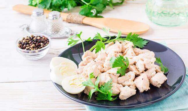 Stewed chicken fillet in a slow cooker a nutritious dinner on a low carb diet